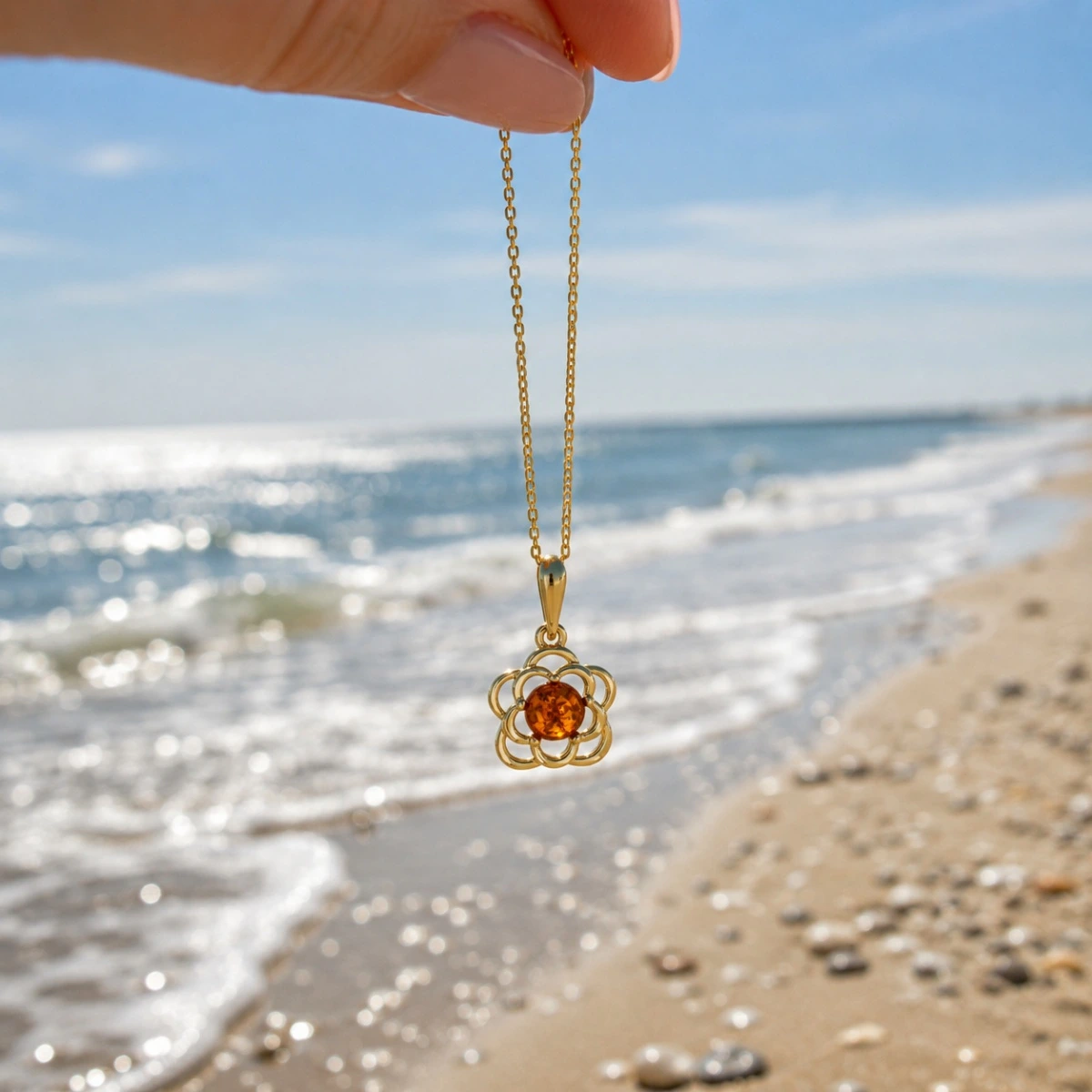 anhaenger-gold-375-bernstein-bluetenblaetter-meer Eleganter Anhänger Gold 375 Bernstein Sommerblumen mit rundem Bernstein in goldener Blütenfassung; Goldanhänger Blume mit Bernstein