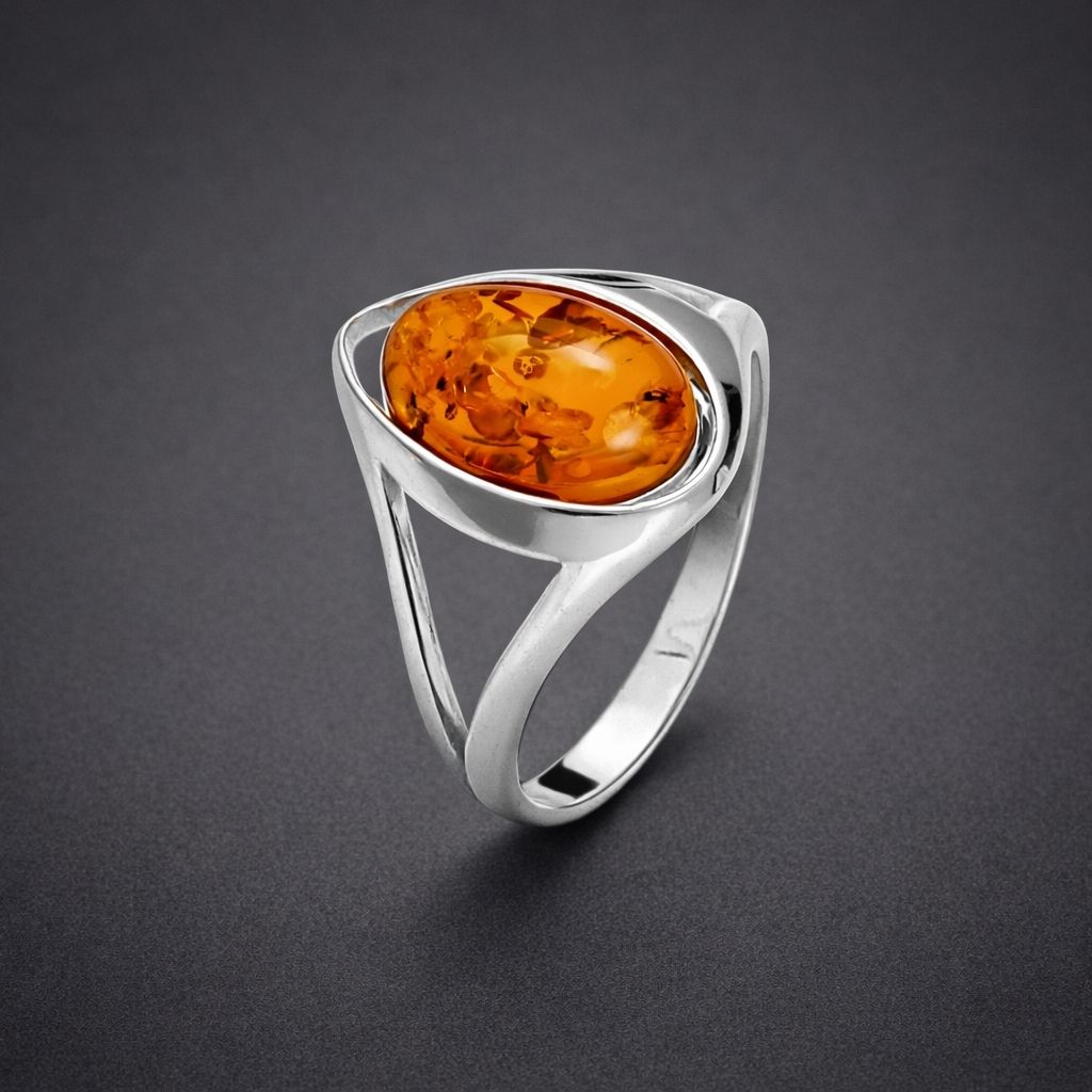 ring-silber-925-rhodiniert-bernstein-pur-6 Ring Silber Bernstein Pur - eleganter Silberring mit cognacfarbenem Bernstein in gewellter Fassung aus 925er Silber.