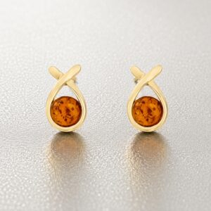 Kleine goldene Ohrstecker Gold 375 Goldfisch mit Bernstein - Ohrringe in Fisch-Form aus 375er Gold mit einem runden, braun-gelben Bernstein.