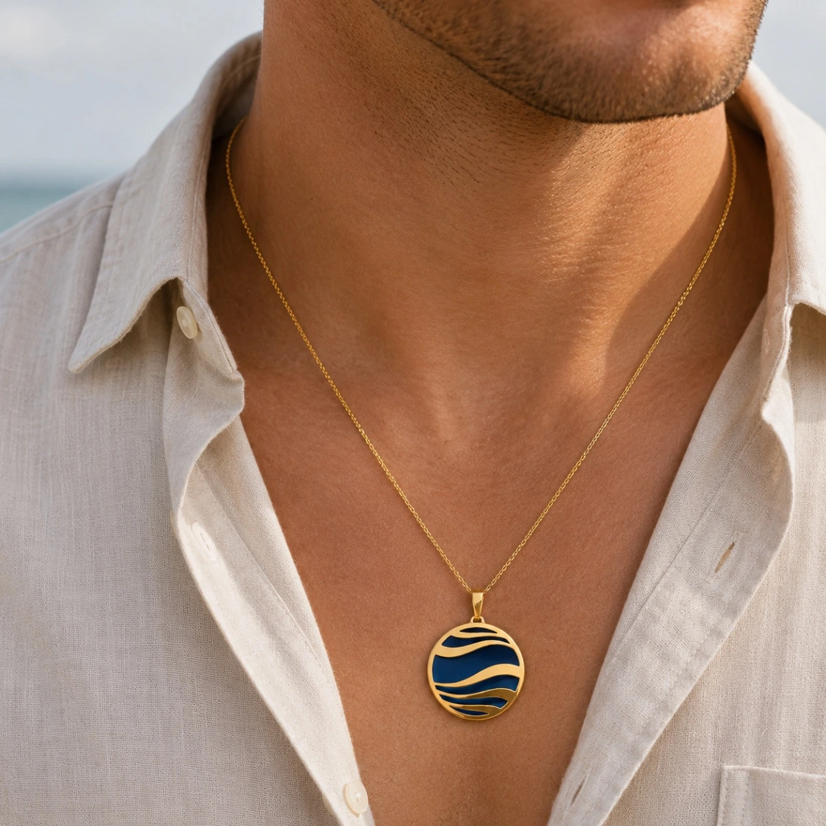 anhaenger-silber-925-vergoldet-mit-titan-welle-blau-mann Eleganter Anhänger Silber 925 vergoldet mit Titan Welle Blau, runder Anhänger mit maritimem Wellenmotiv