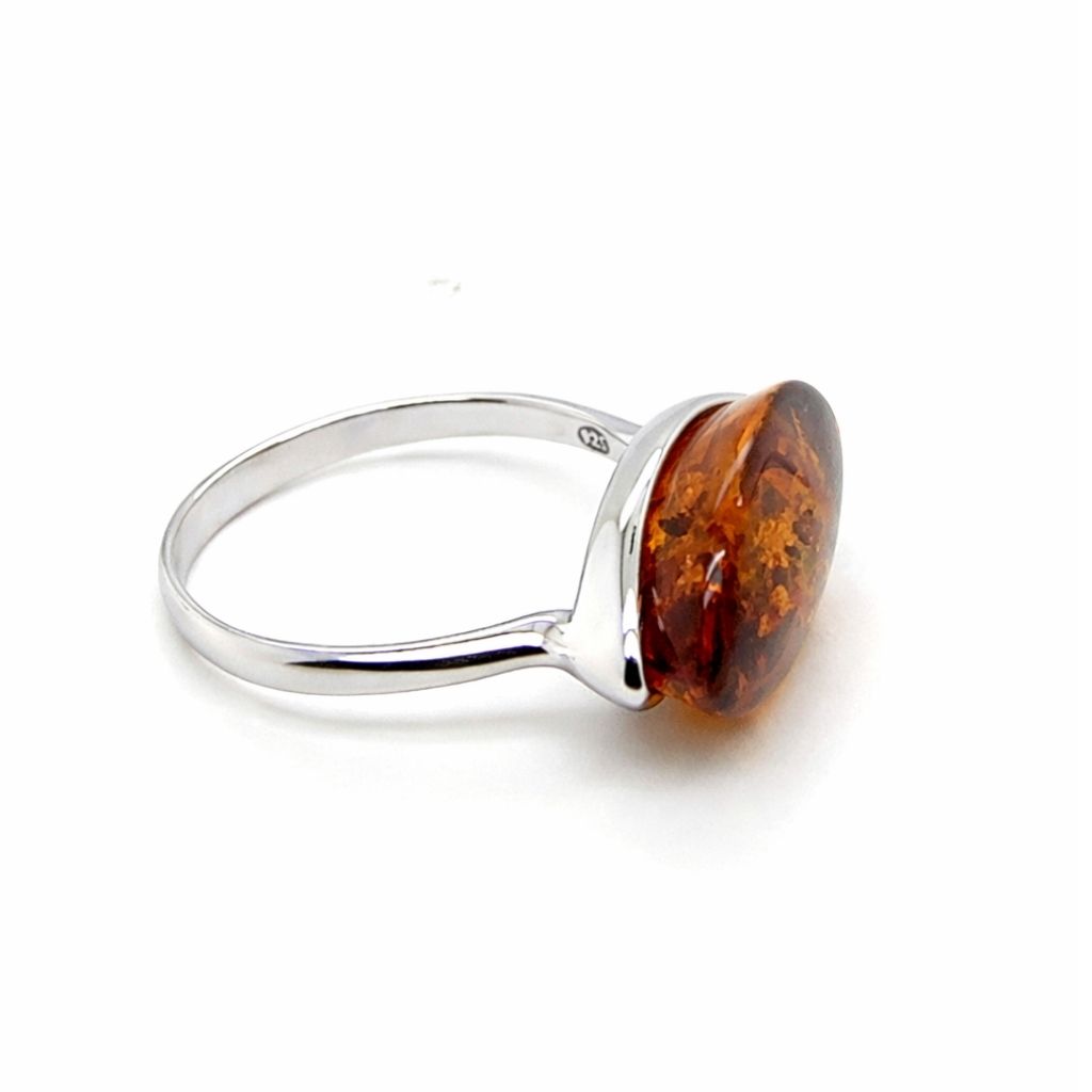 Ring Silber 925 rhodiniert Bernstein Kern (1) Eleganter Ring Silber 925 rhodiniert mit einem ovalen, cognacfarbenen Ostseebernstein - ein eleganter Silberring mit Bernstein