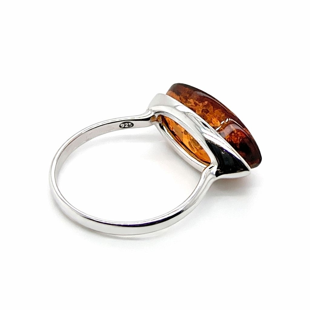 Ring Silber 925 rhodiniert Bernstein Kern (9) Eleganter Ring Silber 925 rhodiniert mit einem ovalen, cognacfarbenen Ostseebernstein - ein eleganter Silberring mit Bernstein