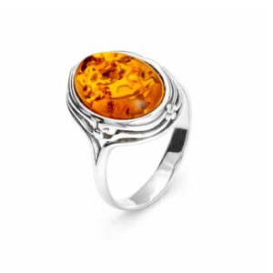 Ring Silber 925 rhodiniert Bernstein Klassik mit ovalem Bernstein in geschlossener Zargenfassung.