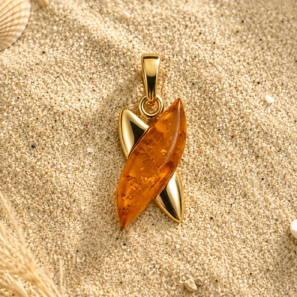 Bernstein Anhänger Gold 375 Urkraft Cognac; Bernstein Anhänger Gold 9 Karat in X-Form; Schmuck mit Ostseebernstein